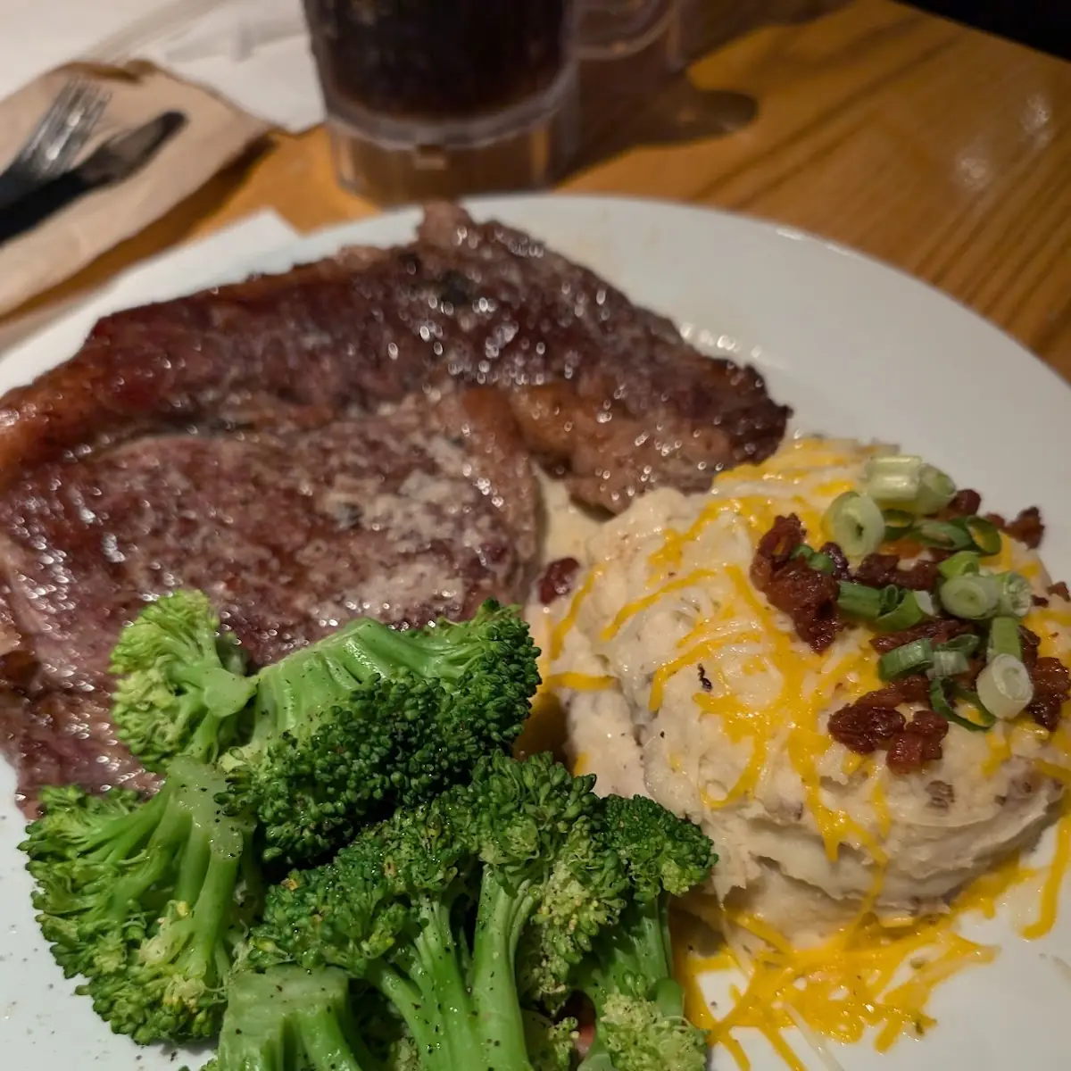 6oz Rib Eye Steak with Loaded Mashed Potatoes and Broccoli
