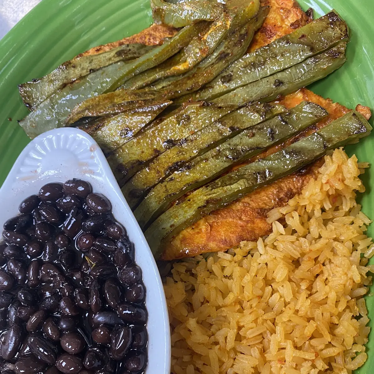 One Cheese Enchilada One Chile Relleno Served with Rice & Beans
