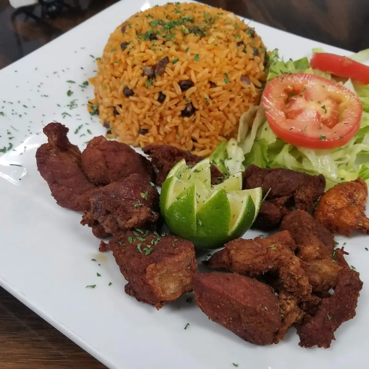 Fried Pork Chunks w Yellow Rice and Beans