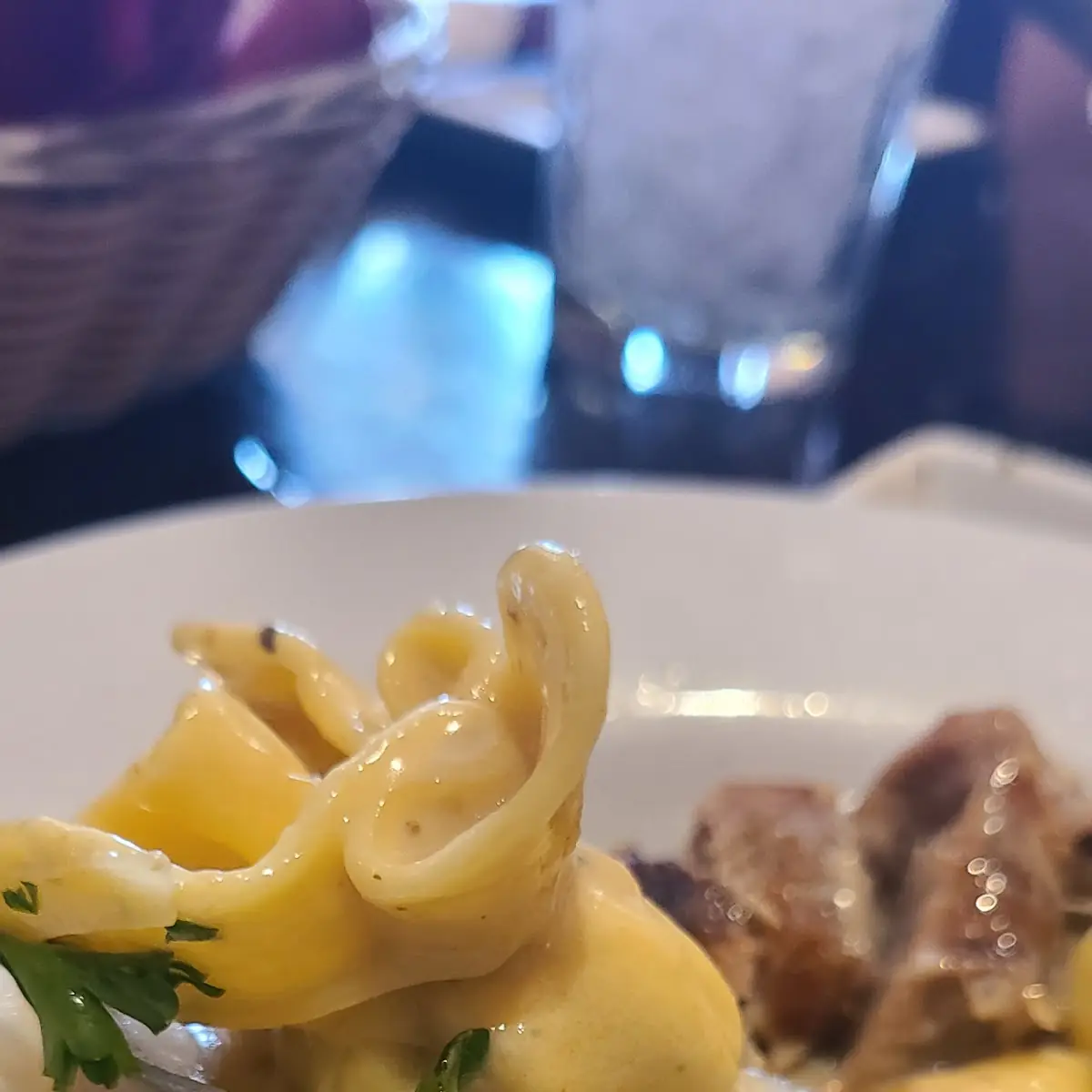 Pan Seared New York Strip Steak over Mushroom Sacchetti w a Spinach Bacon Cream Sauce