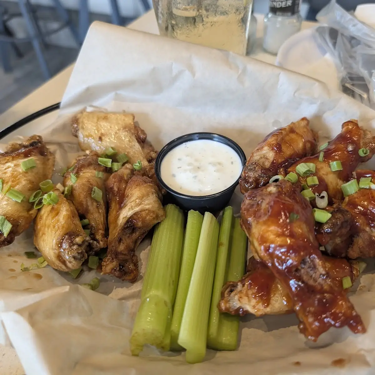 Orange Chicken Wings and Celery Sticks