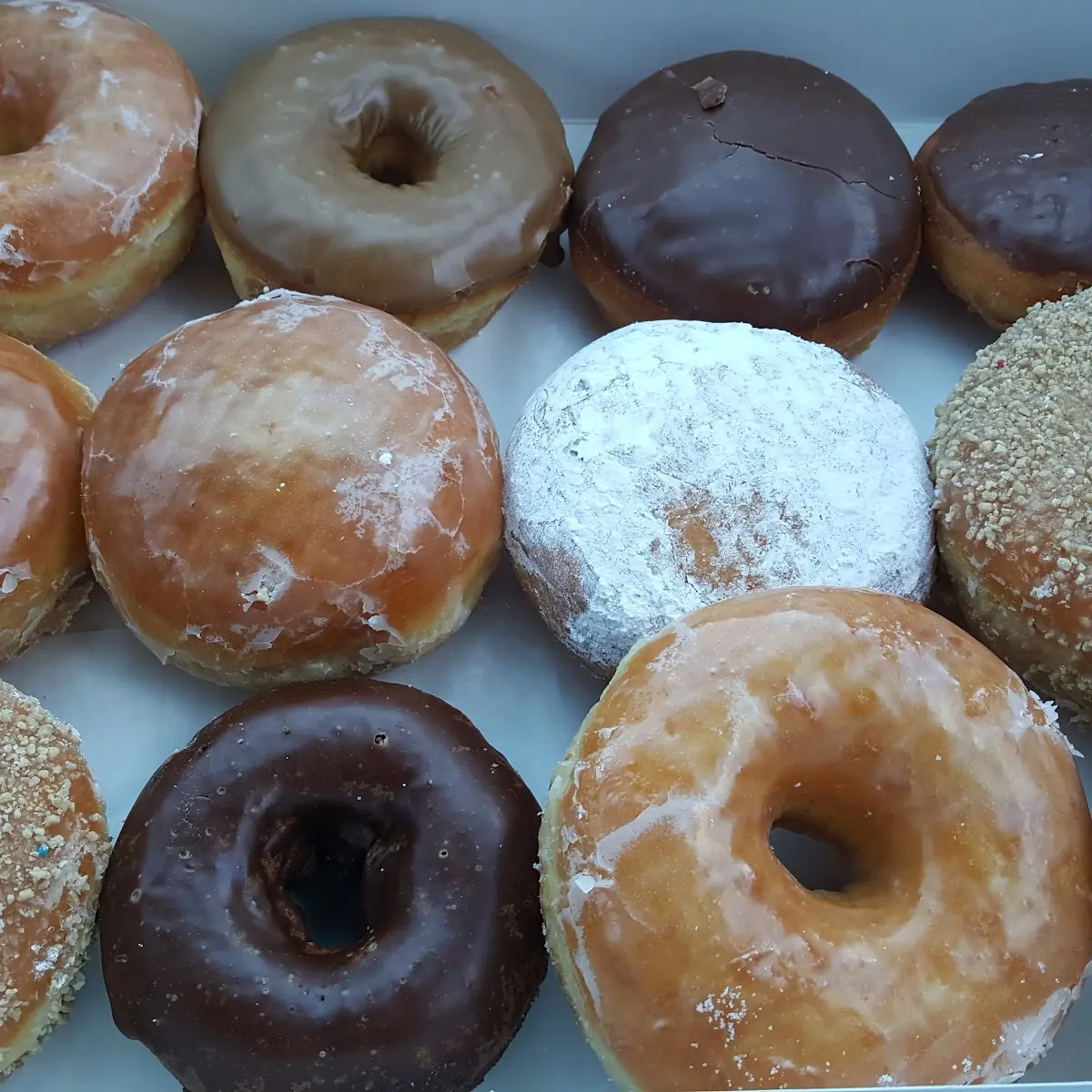Assorted Glazed and Frosted Donuts