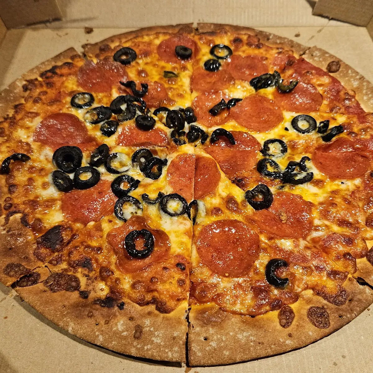 Medium Thin Crust Pepperoni and Black Olive Pizza