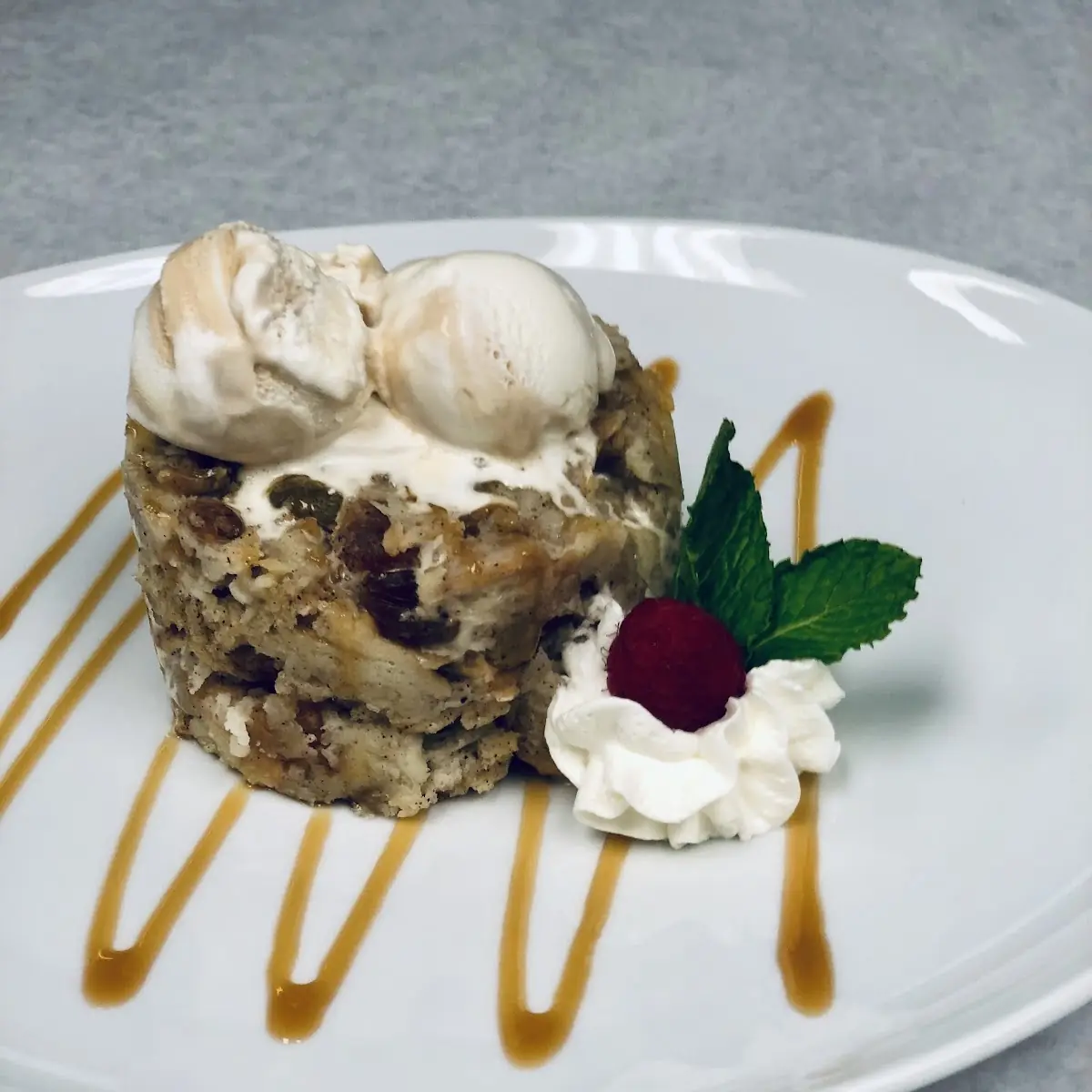Bread Pudding Topped with Vanilla Bean Ice Cream