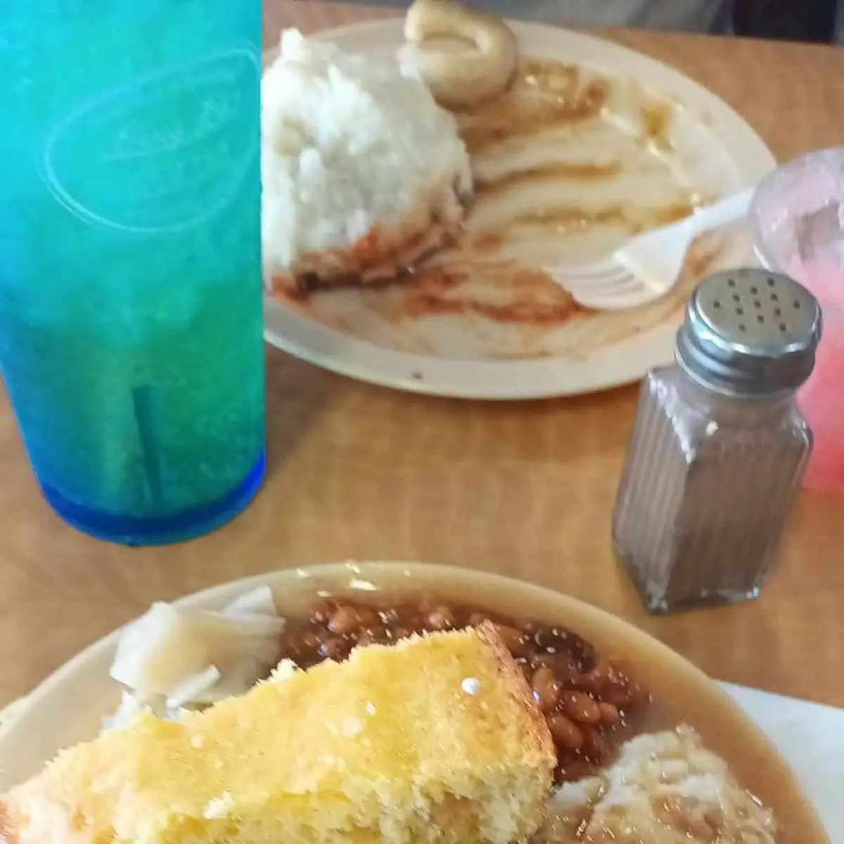 Buffet Dish Cabbage Greens Cornbread Baked Beans and Maybe Cake