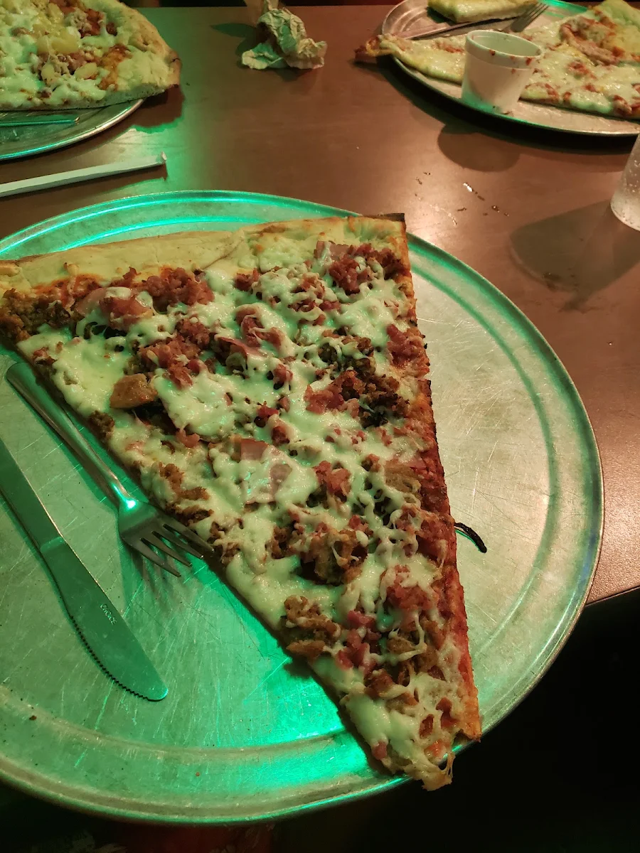 Large Pizza Slice with Beer