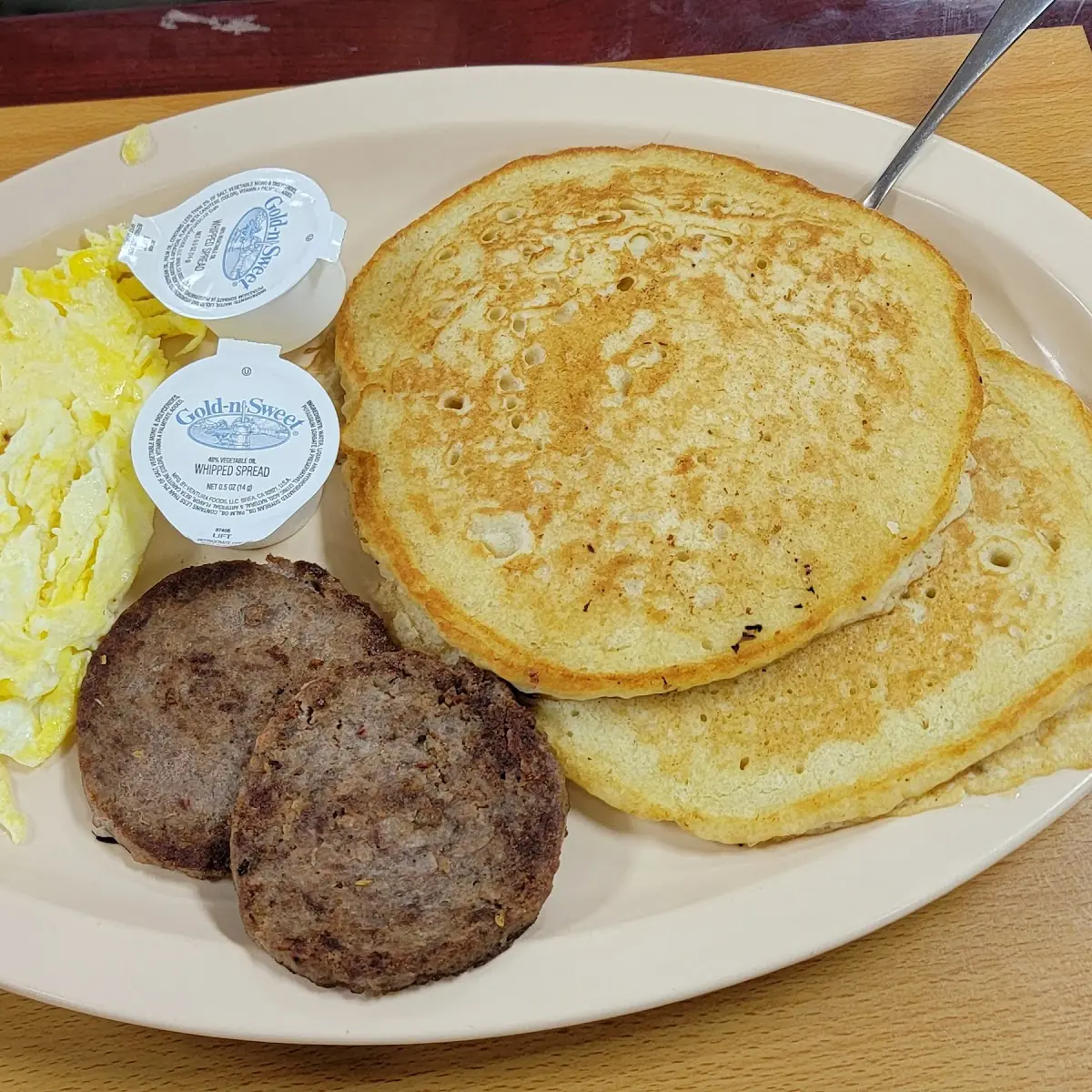 Pancakes Sausage and a Side of Scrambled Eggs
