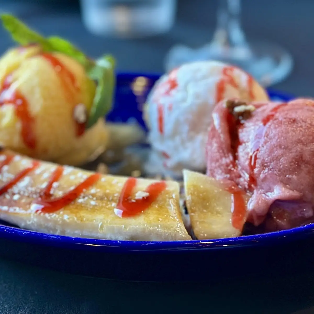 Caramalized Banana Split with Vanilla Cherry Raspberry Candied Pecans