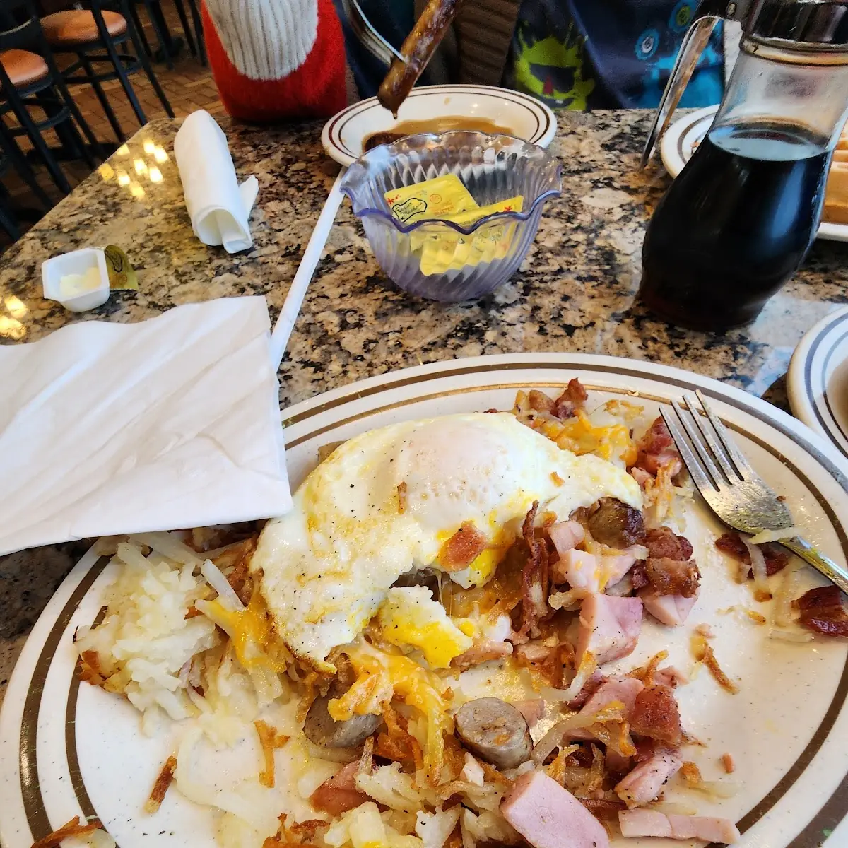 Two Extra Large Eggs with Hash Browns with Hash Browns Toast and Jelly