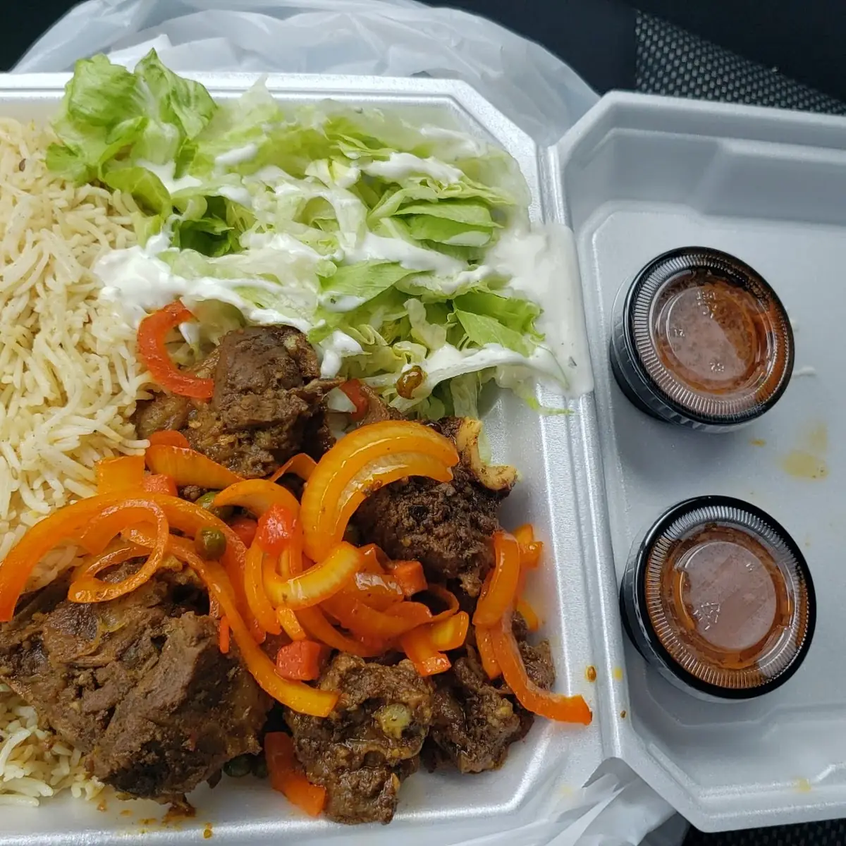 Goat and Rice w Hot Sauce