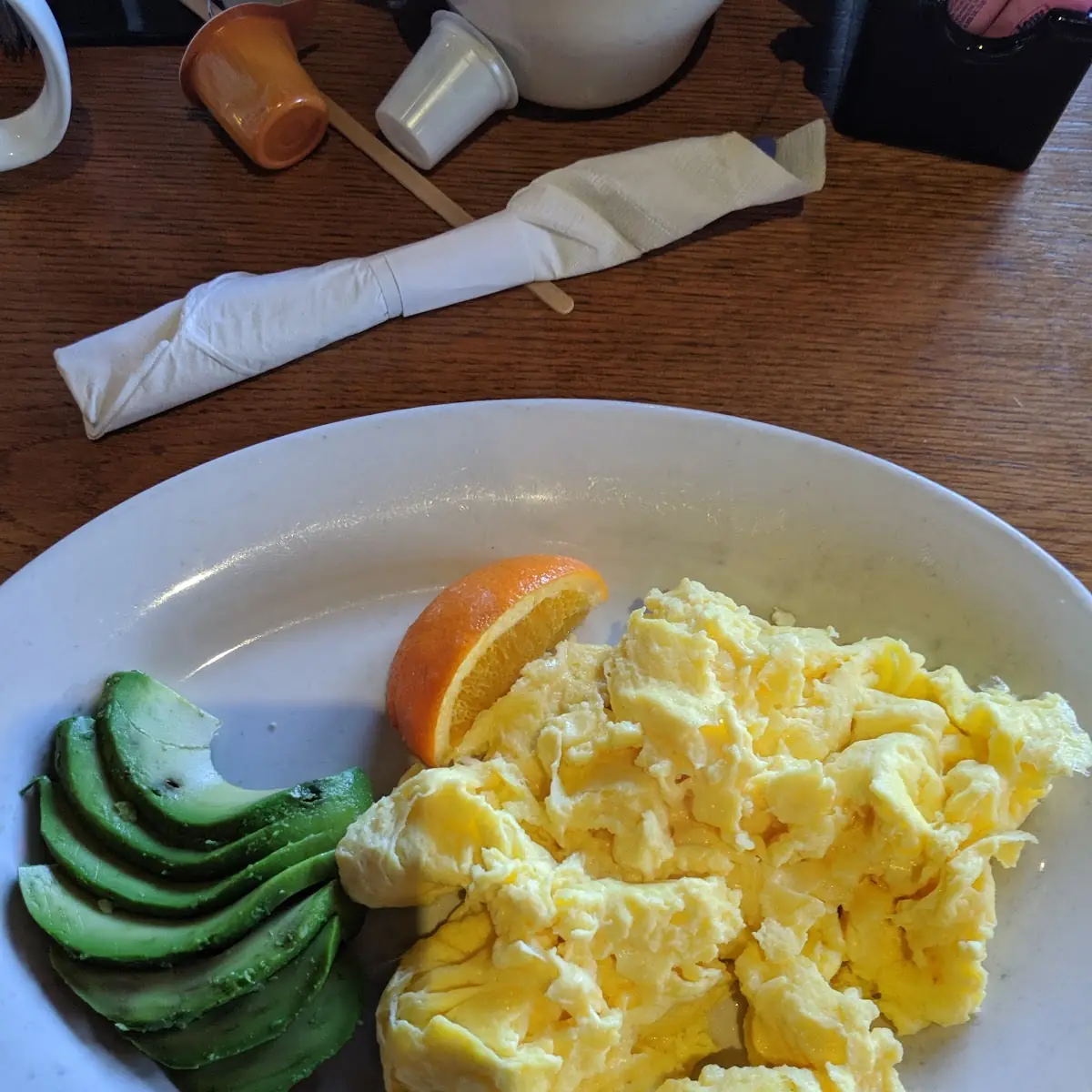 Two Eggs Fruit and Toast