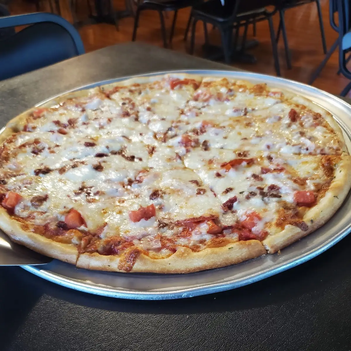 2 Large Cheese Pizza, Garden Salad, 10 Wings, 2 Cannoli, 2 Liter Soda