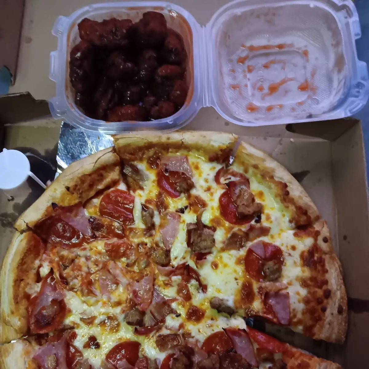 Meat Lovers Pizza and BBQ Wings
