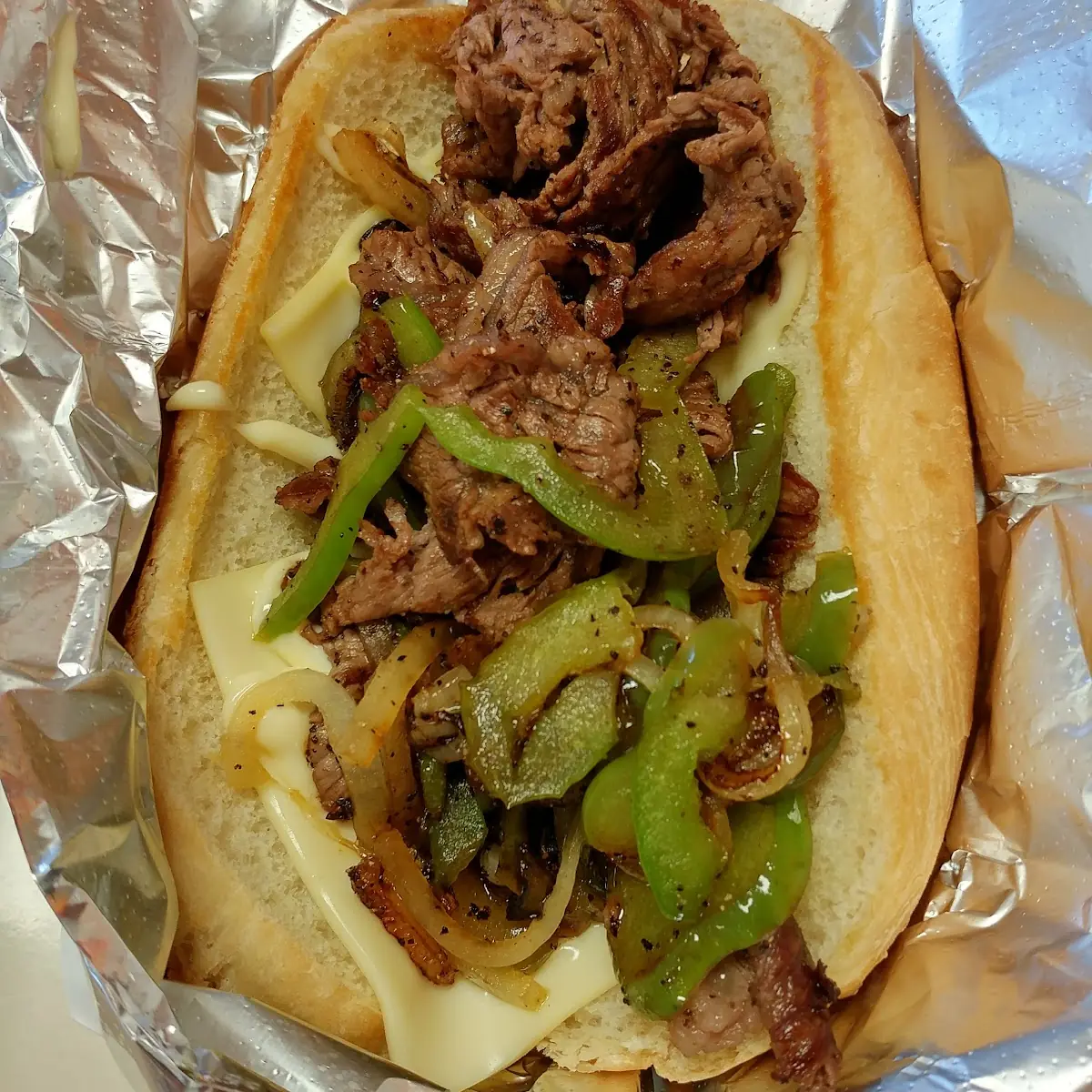 Rib-Eye Philly Cheesesteak Combo