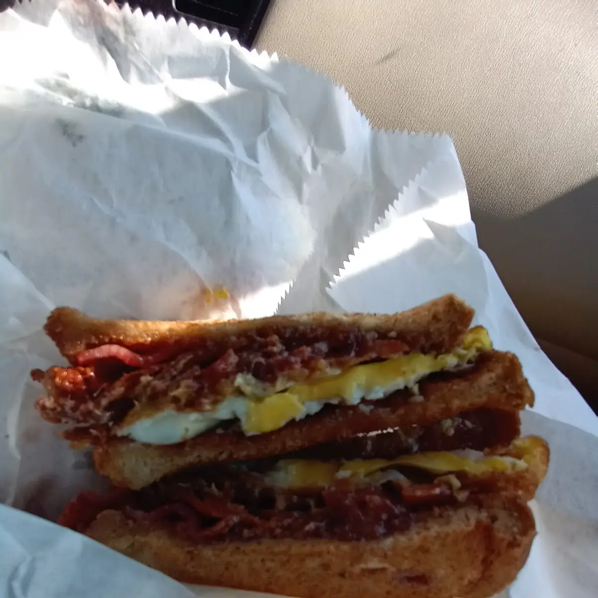 Bacon Egg and Cheese on Wheat with Jam