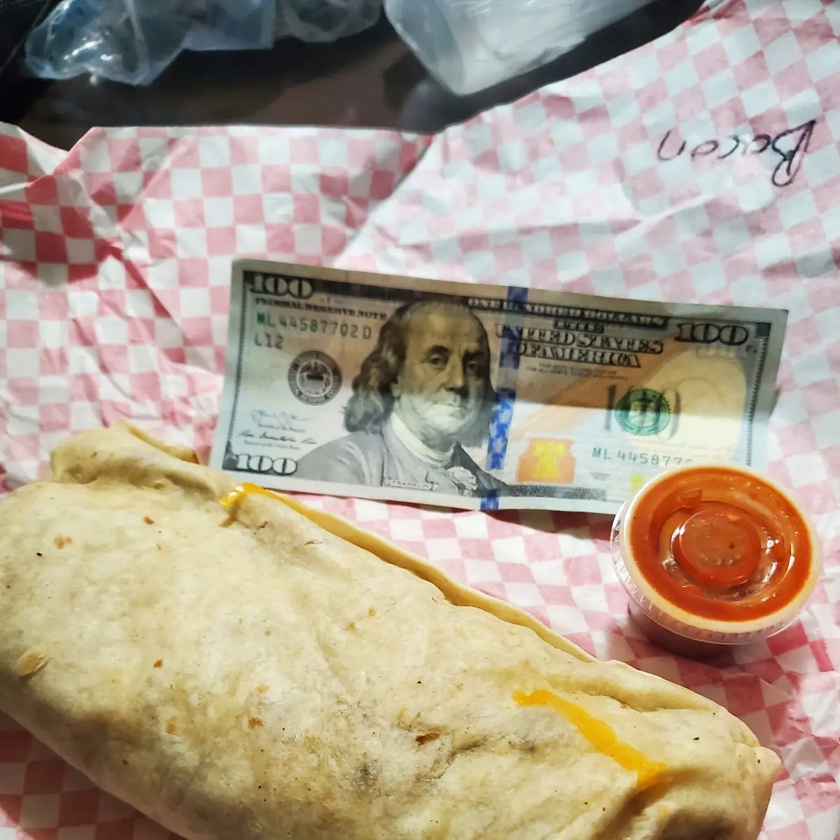 Bacon, Potatoes, Eggs, & Cheese Burrito