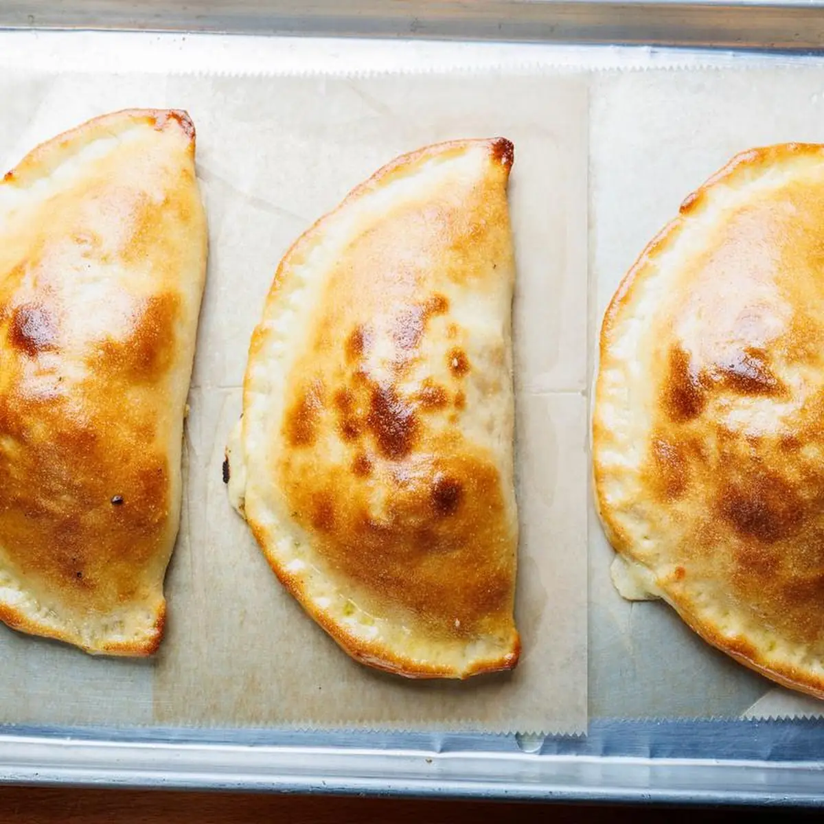 Calzone with Seasoned Ricotta and Mozzarella Cheese Add Toppings for an Additional Charge