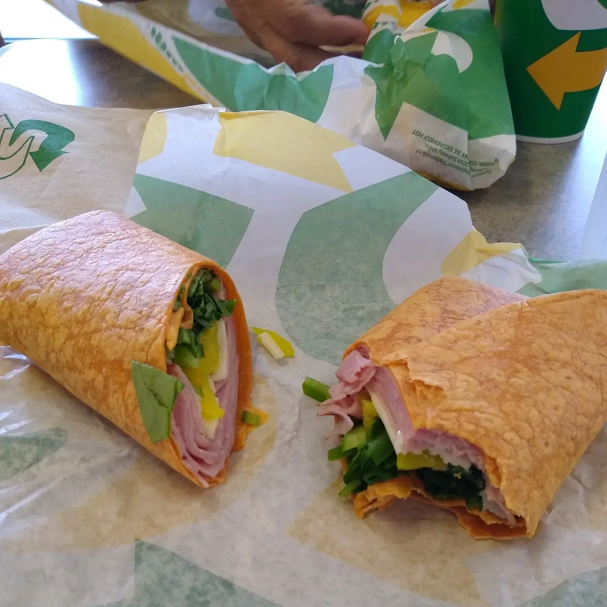 Tomato Basil Wrap Ham Pepper Jack Cheese Spinach and Banana Peppers