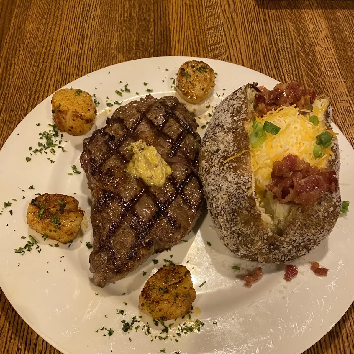 Strip Steak Dinner with Loaded Baked