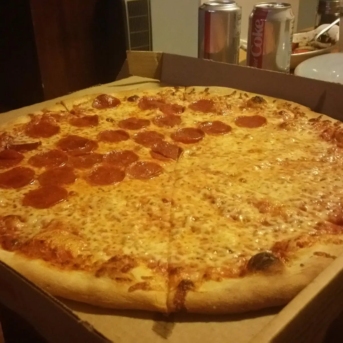 Pepperoni Pizza and Half Plain Cheese Pizza