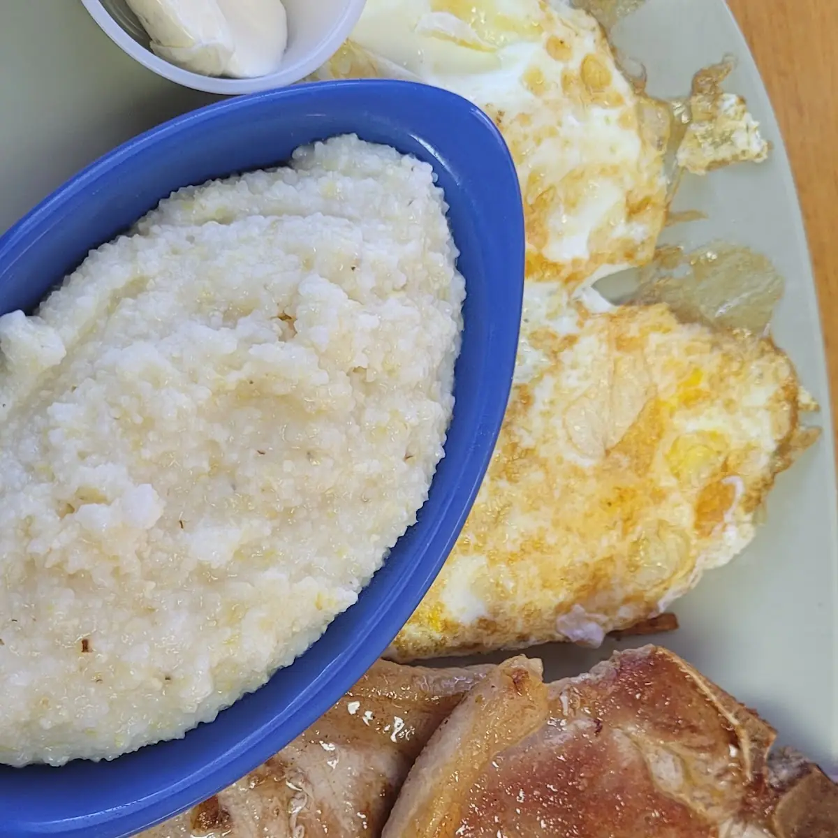 Grill Chops Eggs Grits Toast
