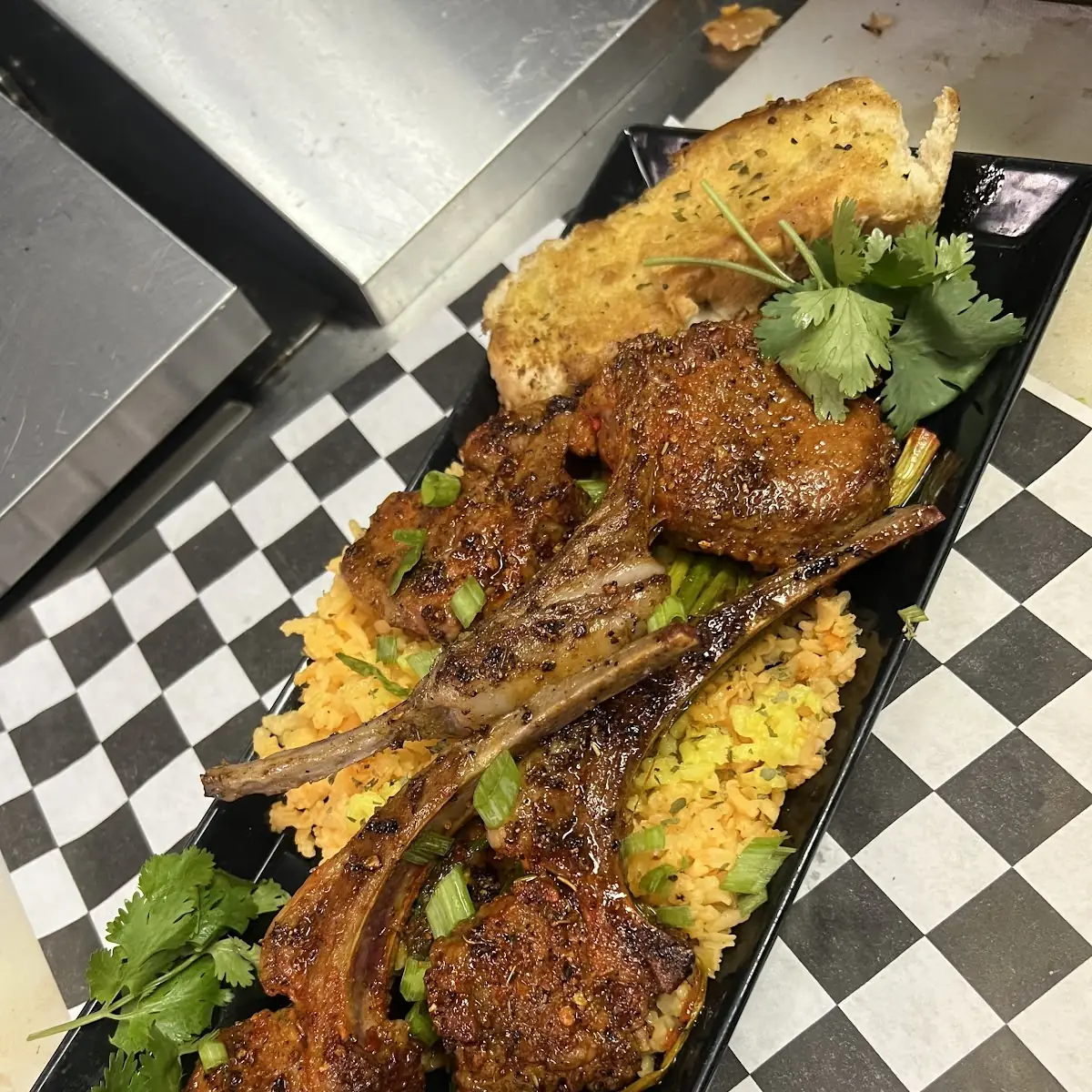 Lamb Chops over Yellow Rice