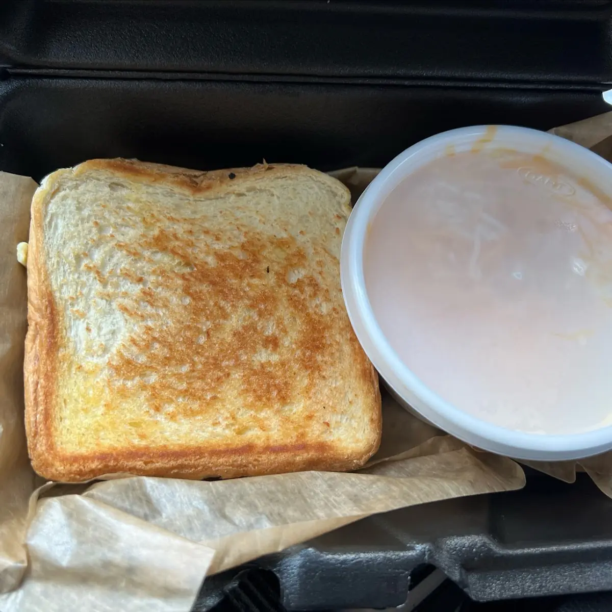 Egg and Cheese Sandwich with Cheese Grits
