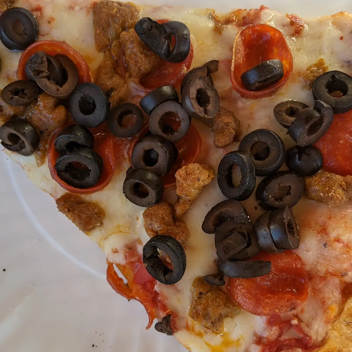 Black Olive Pepperoni Sausage Pizza
