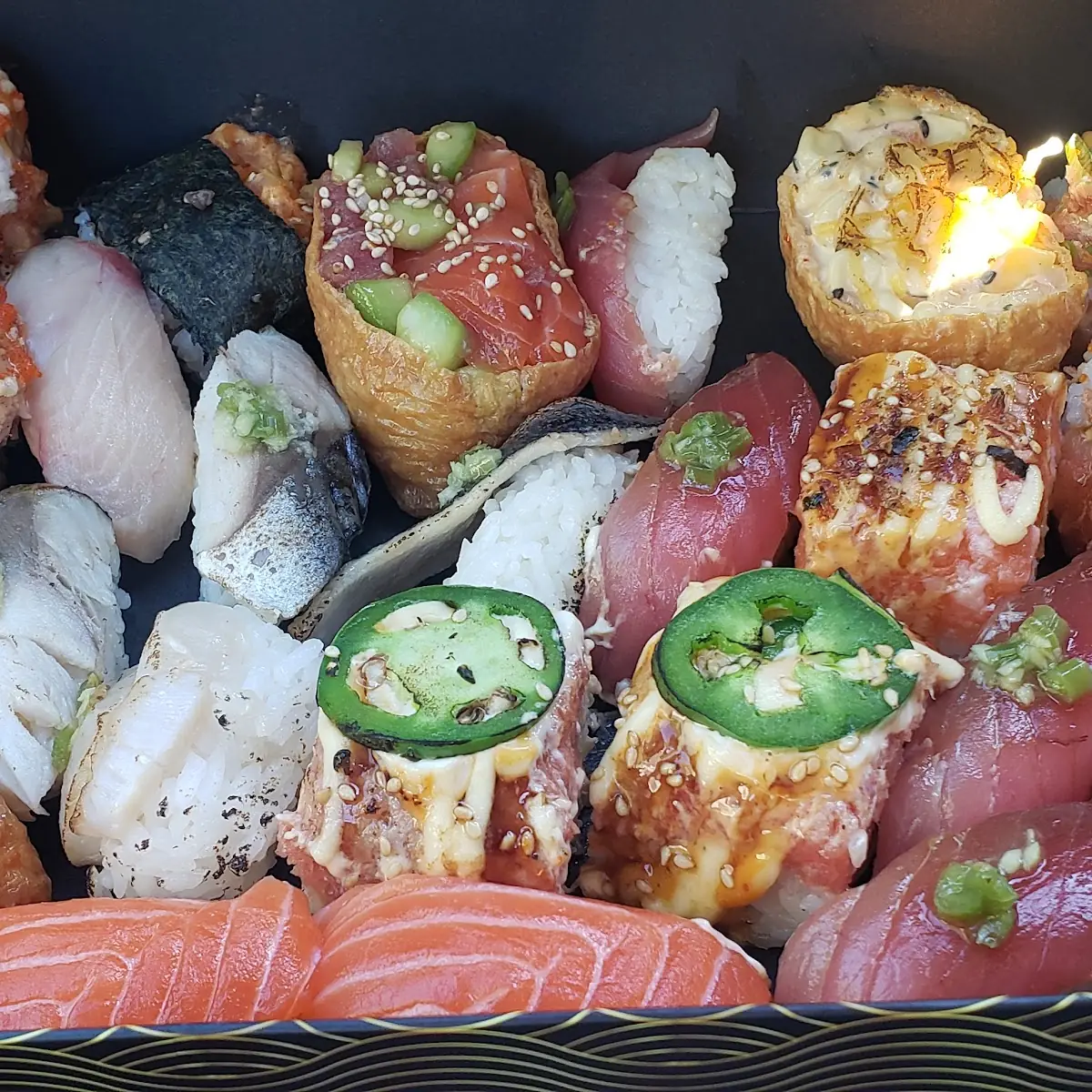 Assorted Sushi and Poke Rolls