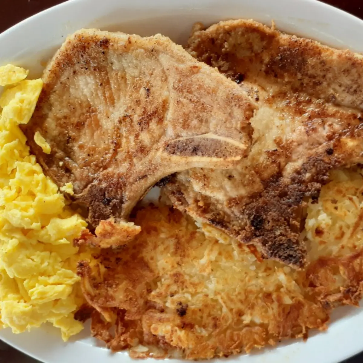 2 Grilled Pork Chops & Eggs