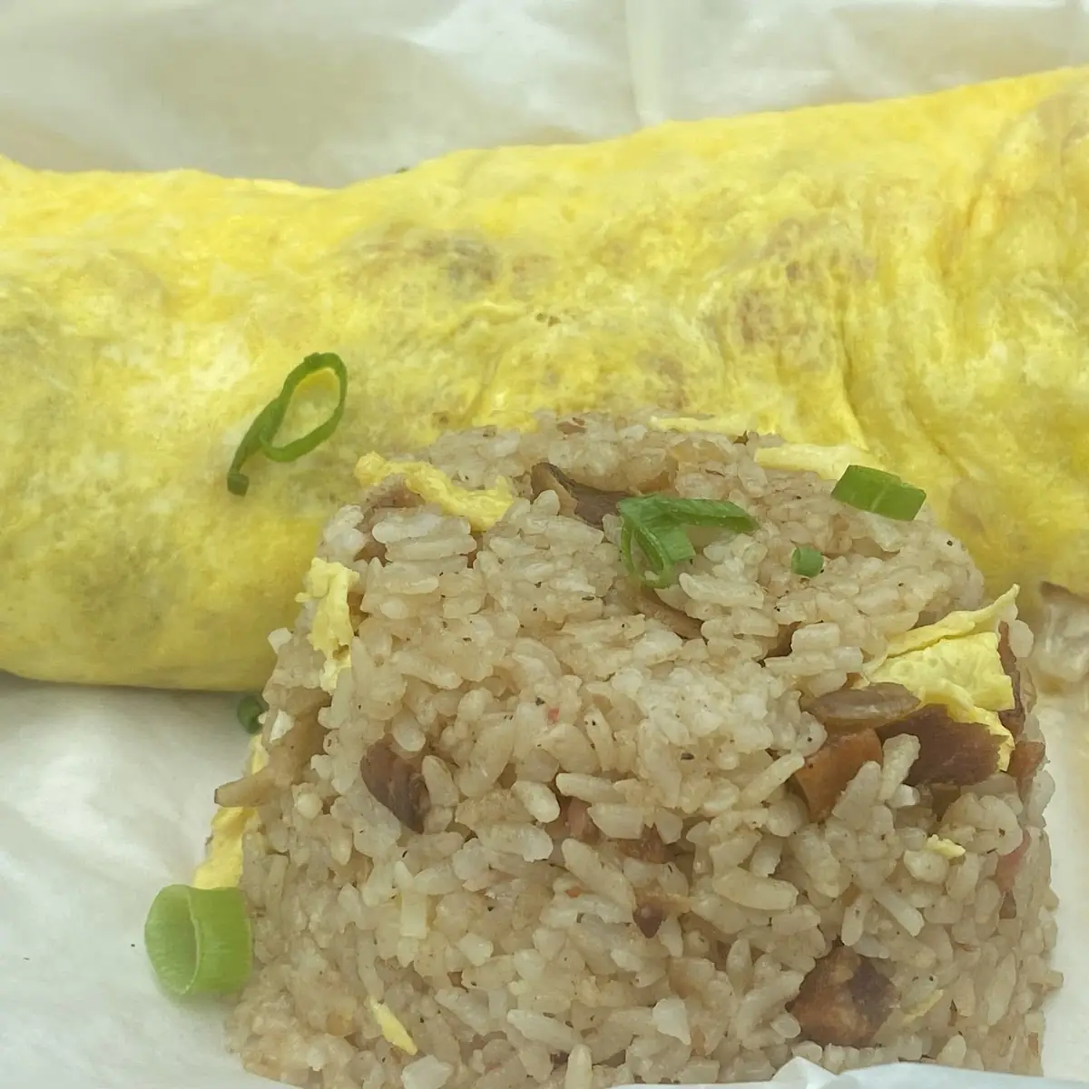 Onolicious Fried Rice Omelette with Melted American Cheese