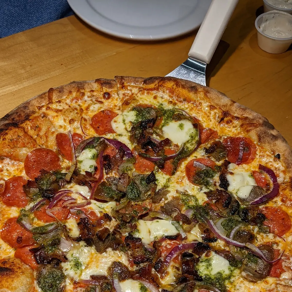 Meat Pizza with Pesto Drizzle