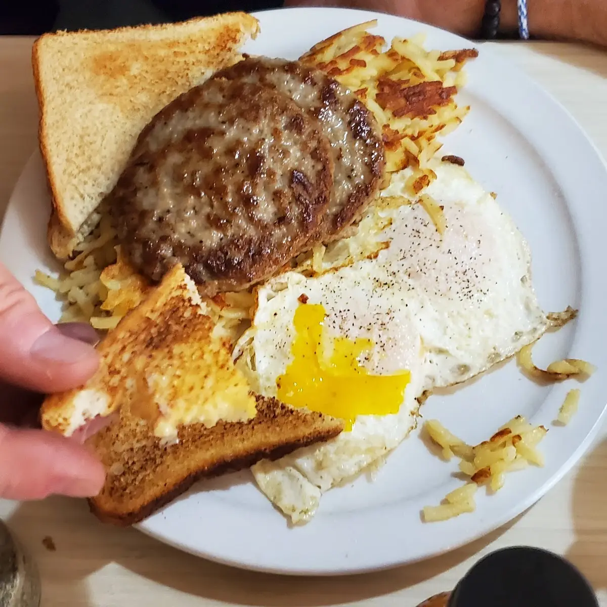 Eggs over Easy Sausage and Hash Browns
