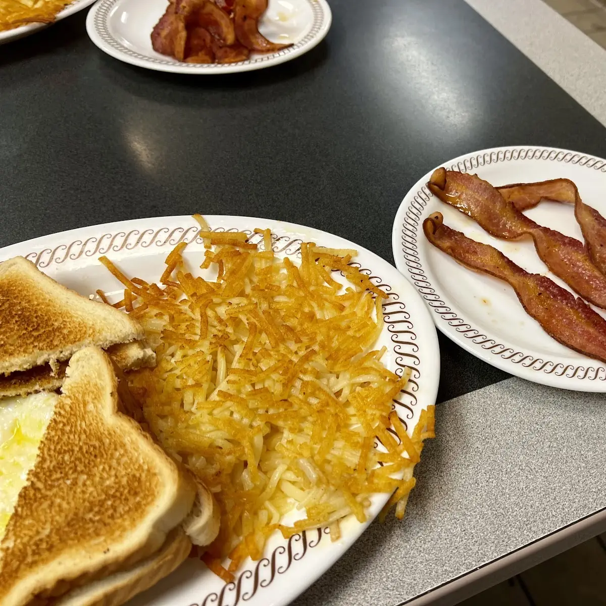 Two Egg Breakfast with Hash Browns and Toast
