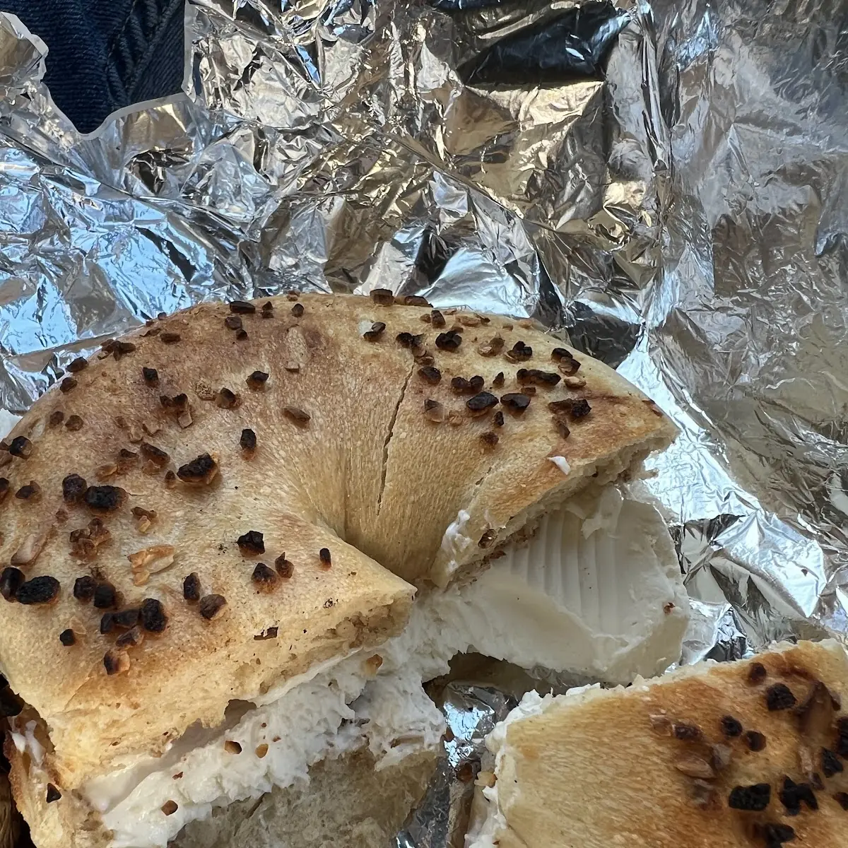 Poppy Seed Bagel with Lox and Onion