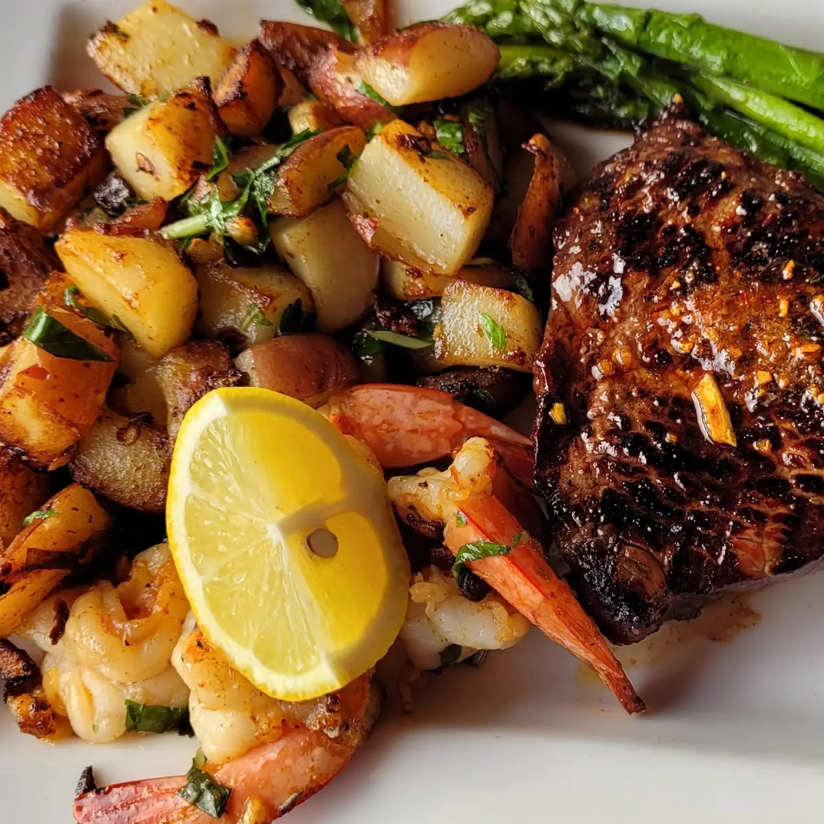 Steak & Barbecued Garlic Prawns