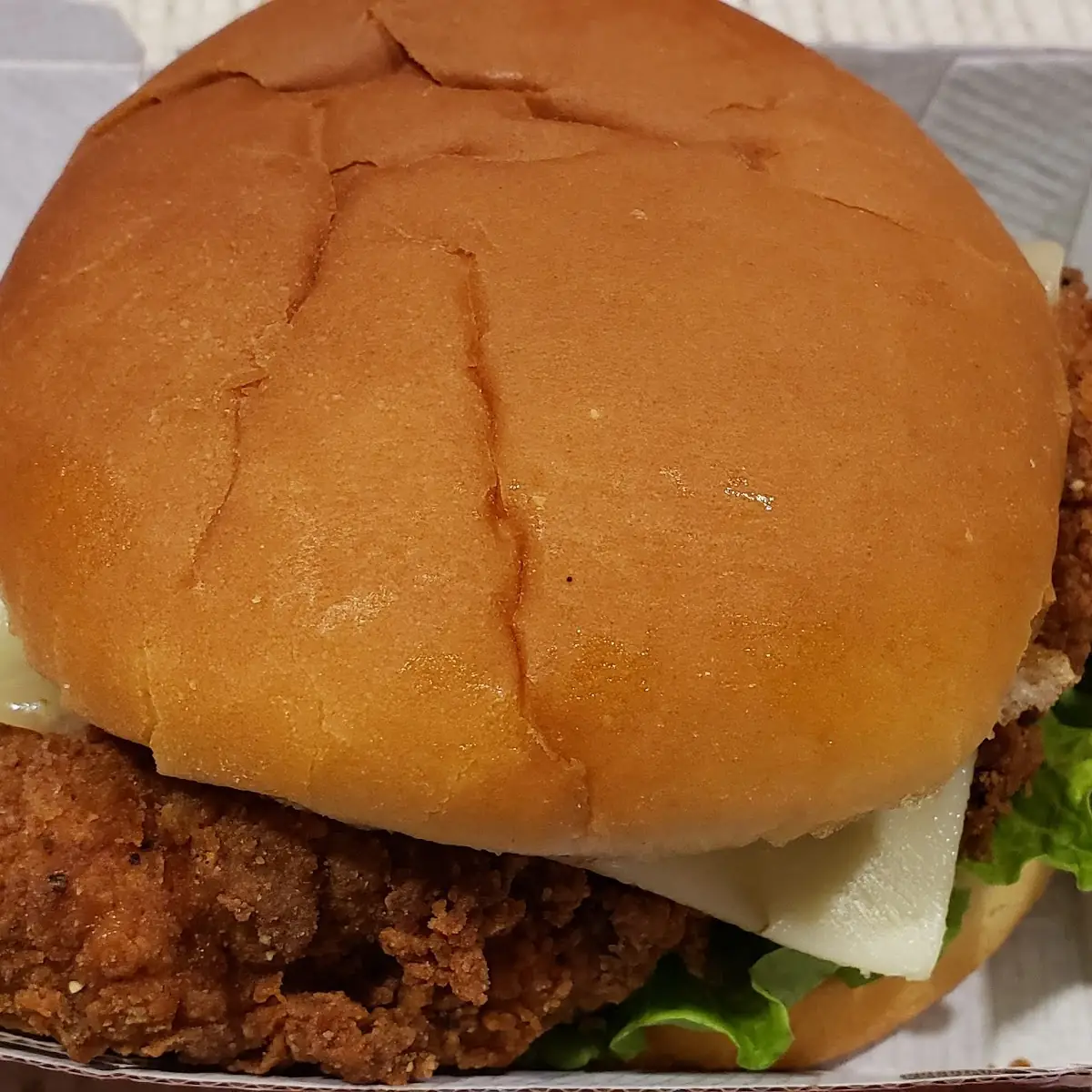 Spicy Chicken Sandwich with Pepper Jack Cheese and Waffle Fries