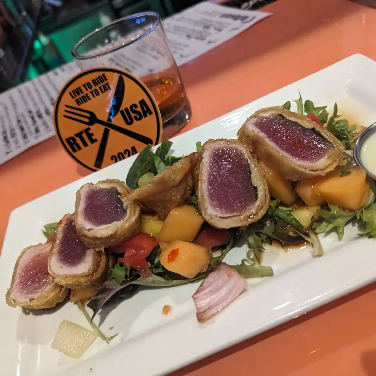 Fried Tuna & Basil Roll with Spicy Pineapple Mixed Melon Sweet Chili Salad Teriyaki & Creamy Wasabi