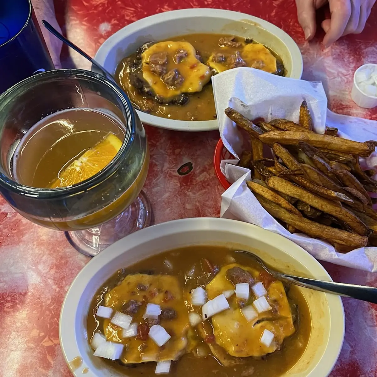 Green Chile Sopper with Onions Bottom Double Green Chile Slopper with Extra Chile Top