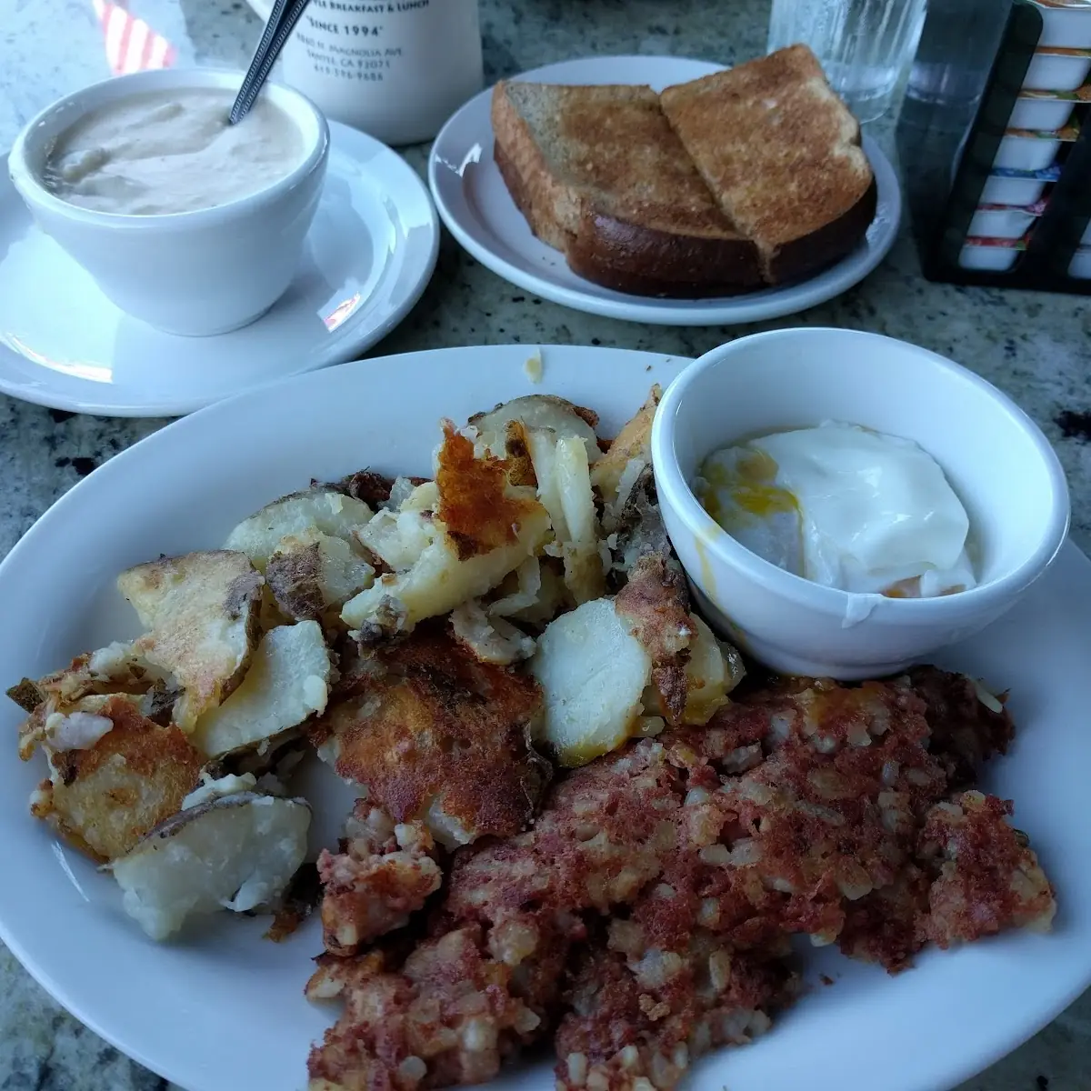 Corned Beef Hash and Poached Eggs with Home Fries