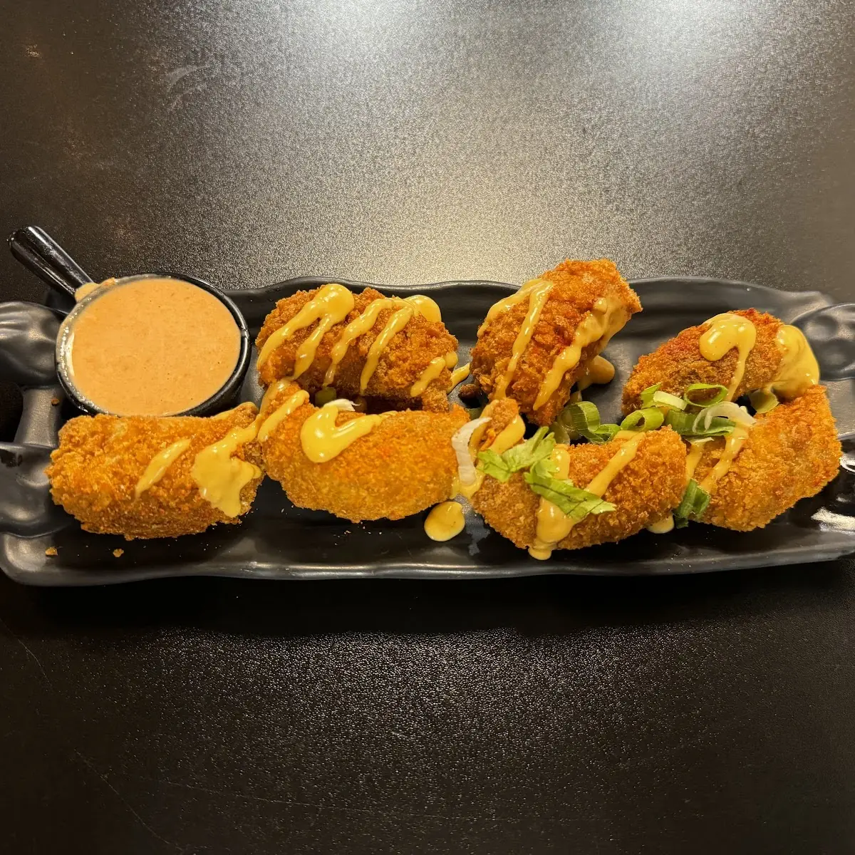 Fancy Fried Momo, Bollywood Cafe Indian Street Eats & Bar.