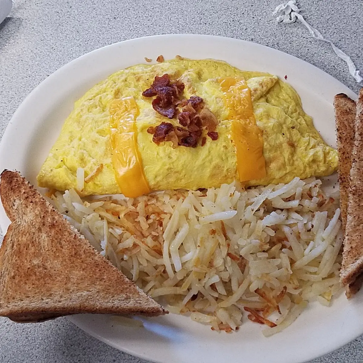 3 Egg Bacon Cheese Omelette & Hash Browns