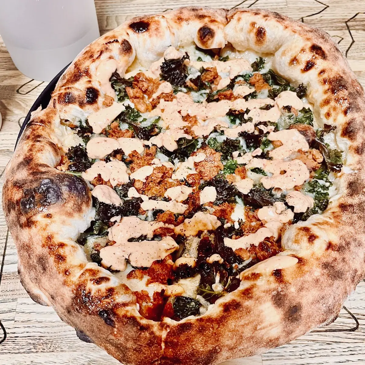 Kale and Sausage Pizza