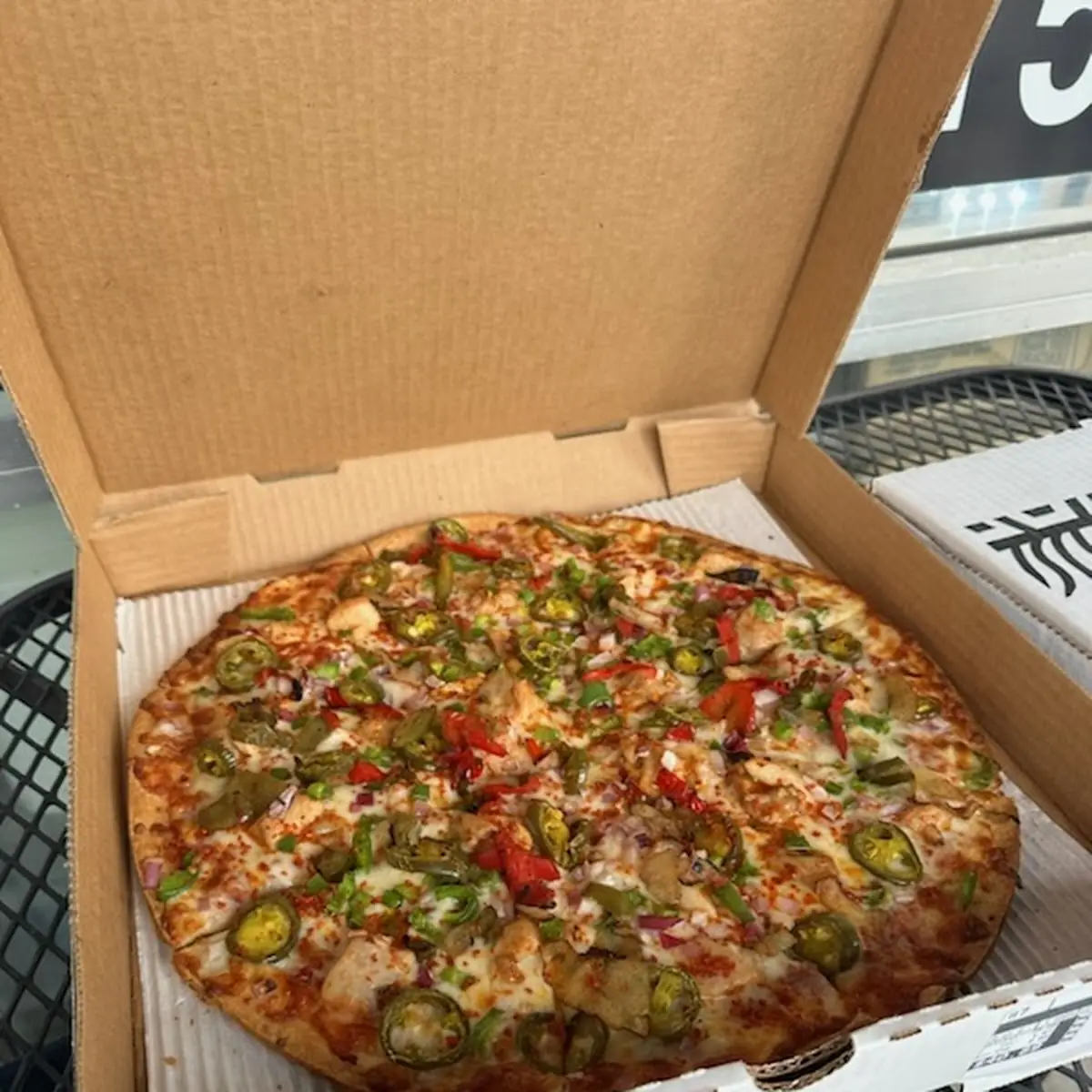 Thin Crust Chicken Tikka Pizza