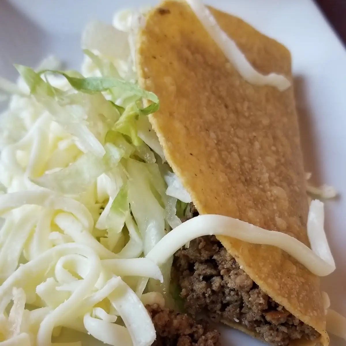 9. Beef Taco, Chicken Quesadilla, Rice & Beans