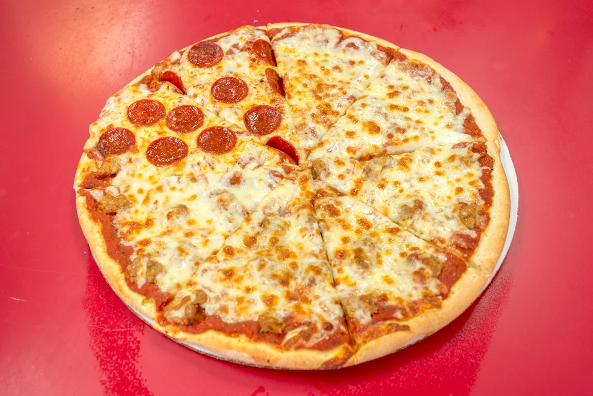 Two 14 Thin Crust Pizzas with 1 Topping on Each 2-Liter RC