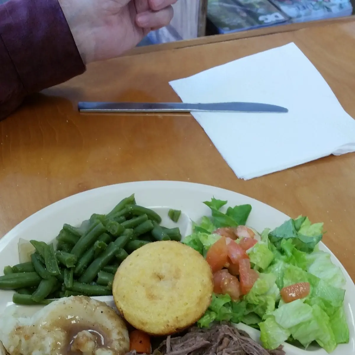 Mama's Pot Roast with Mashed Potatoes Green Beans and a Cornbread Muffin