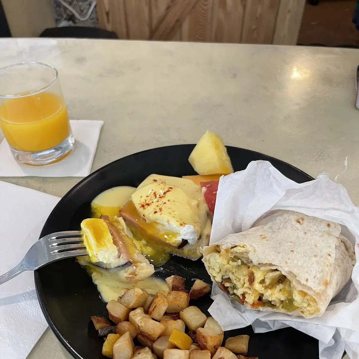 Eggs Benedict and Breakfast Burrito