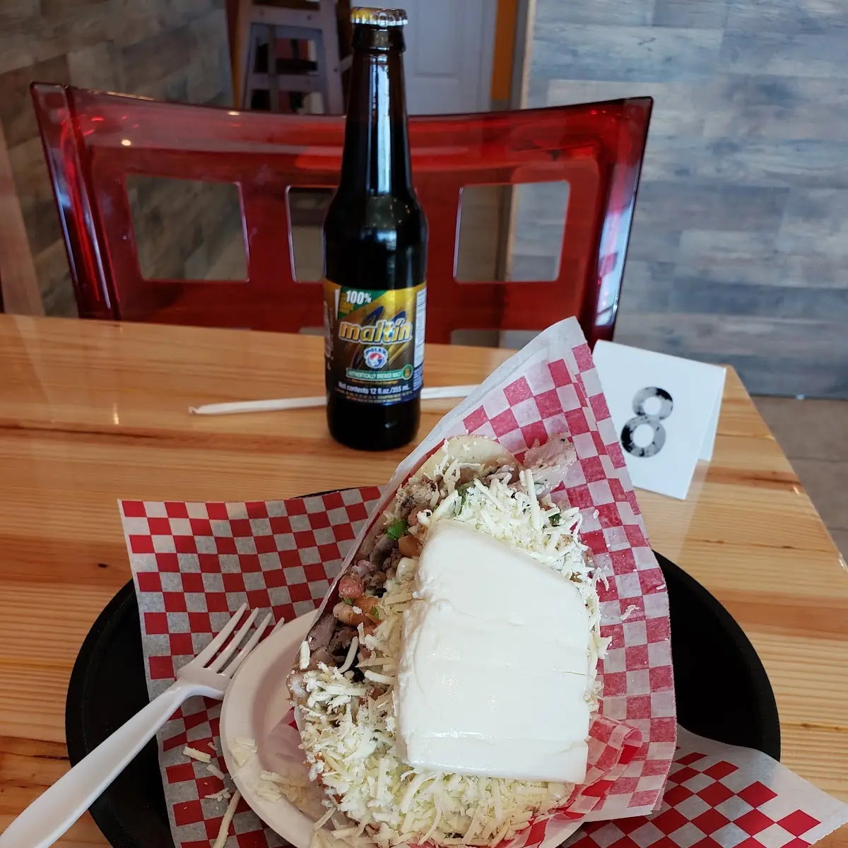 Arepa with Grilled Beef White Cheese and Green Sauce