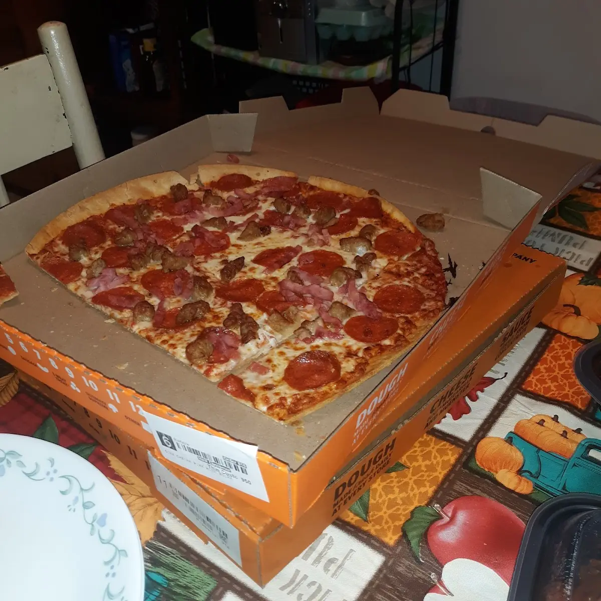 Pepperoni Sausage and Ham on a Thin Crust Pizza
